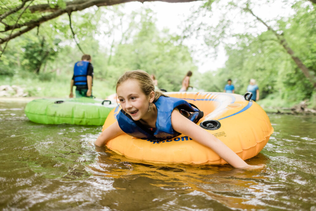 young girl enjoying Iowa rivers