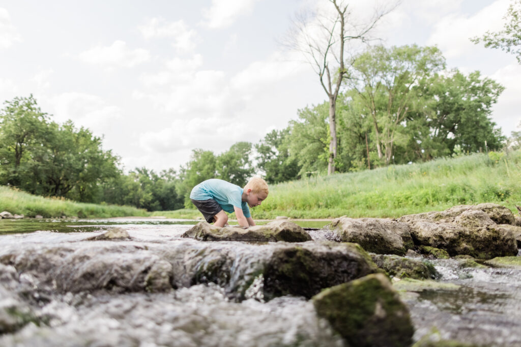 child playing in Iowa streams